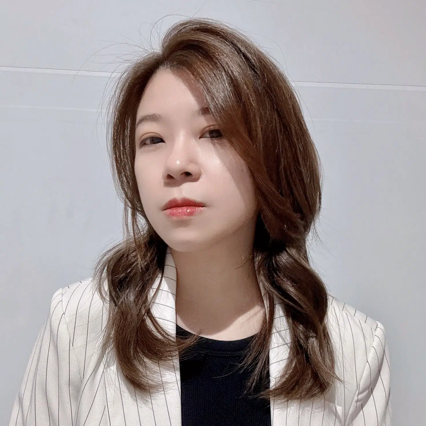 Esther Chang, Creative Director at Bonbon Blowout Bar+ with 14 years experience.