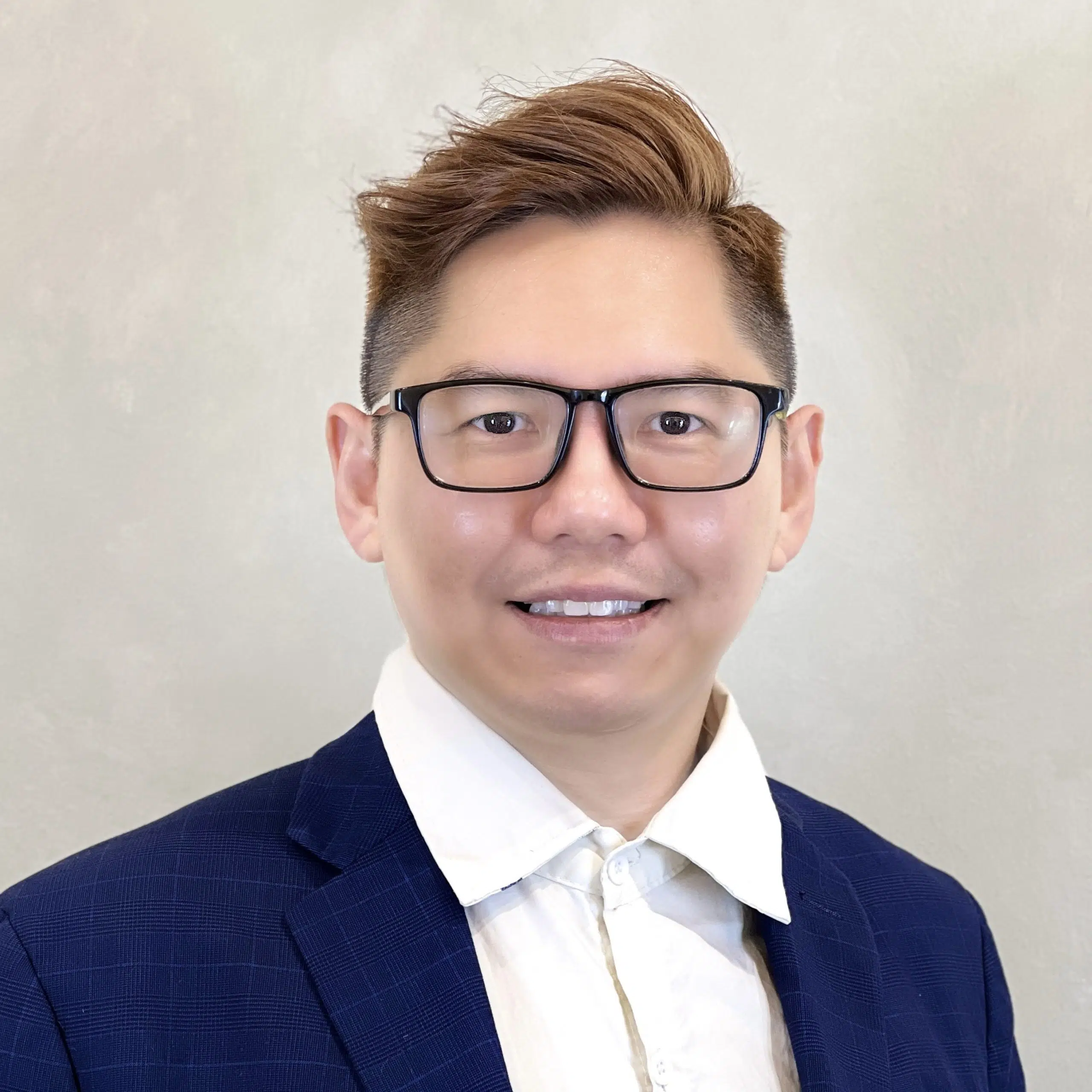 Stefan Tan, Senior Leading Stylist at Bonbon Blowout Bar+ with 13 years experience.